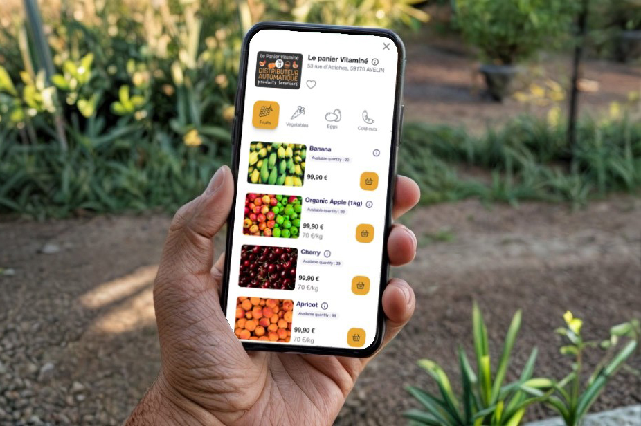 Automat-e-App geöffnet auf einem Smartphone auf einem Feld